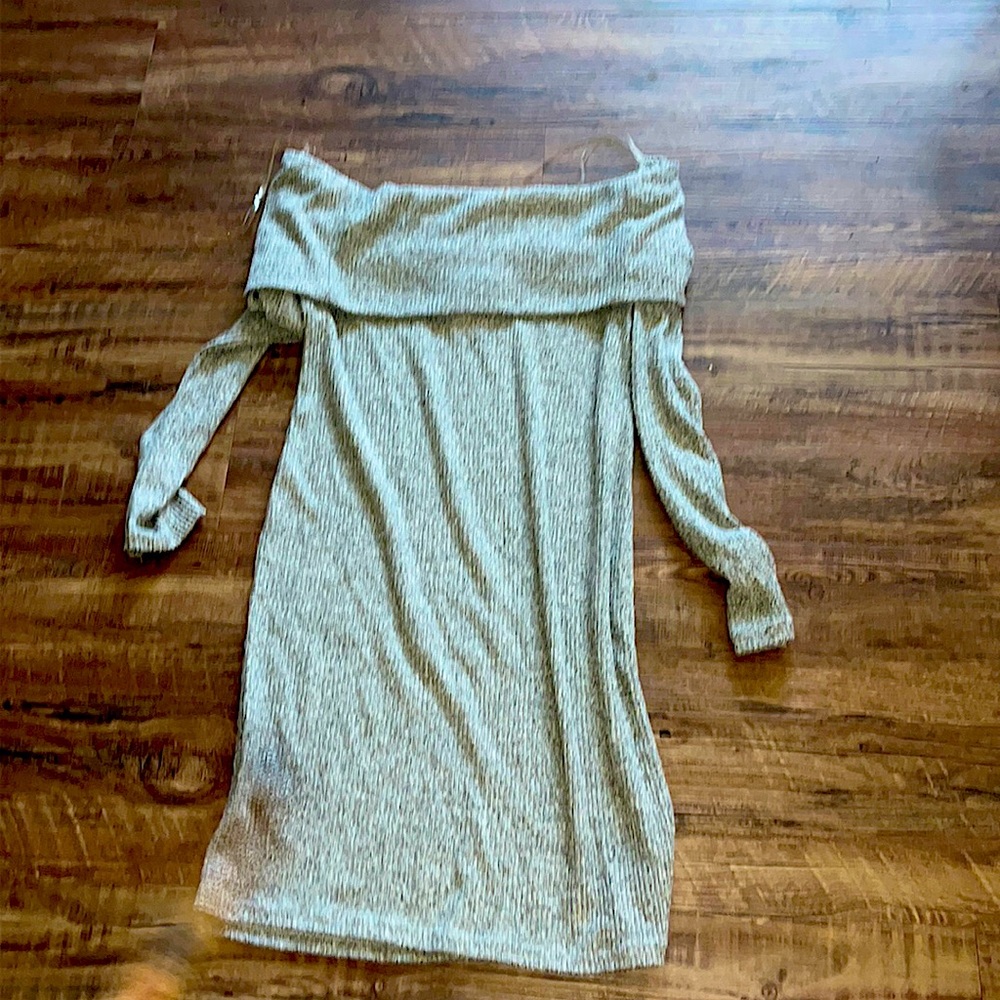 Brand new! Never wore it just not my style I does make your curves look so good.